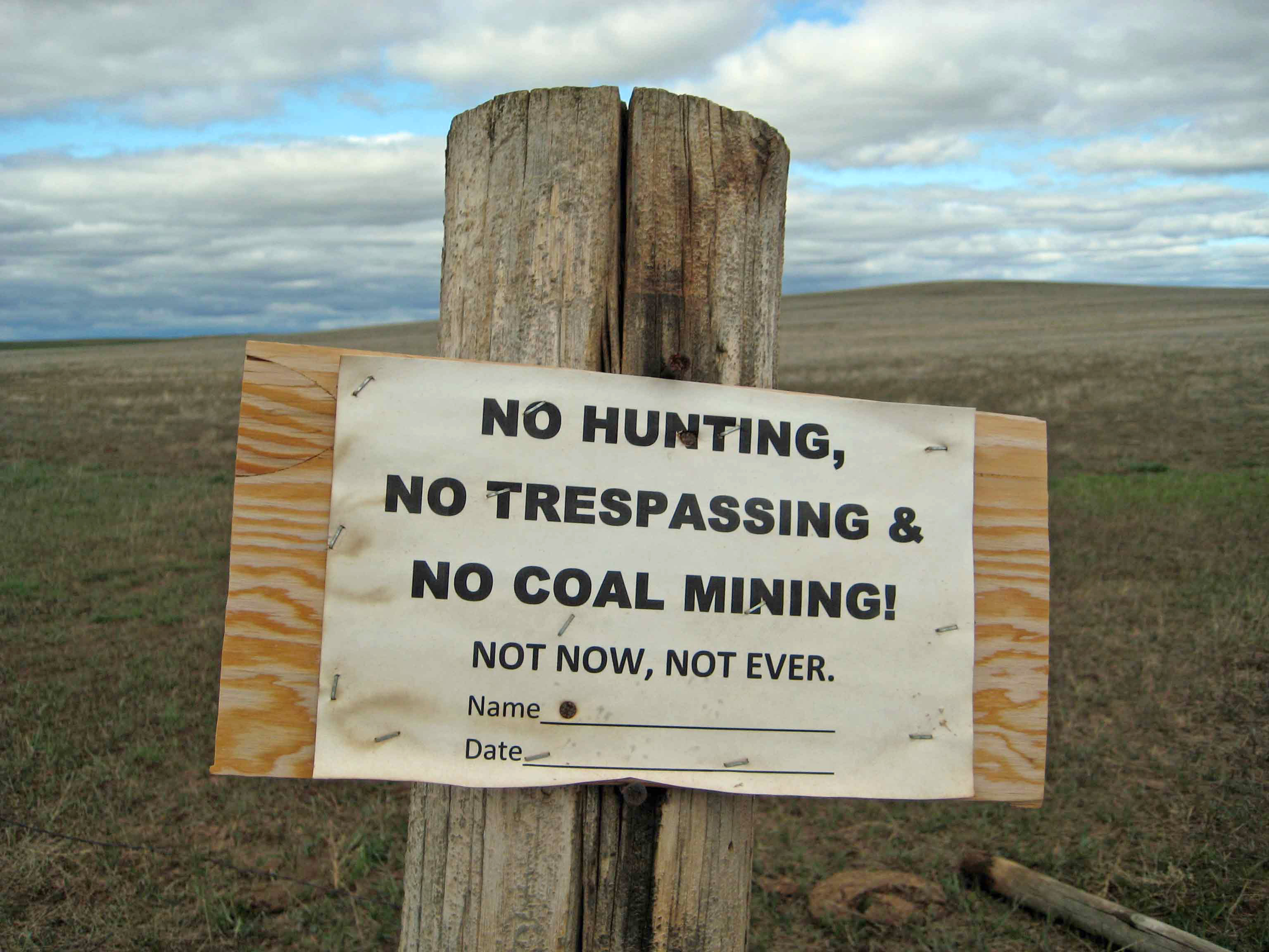 No coal mining sign