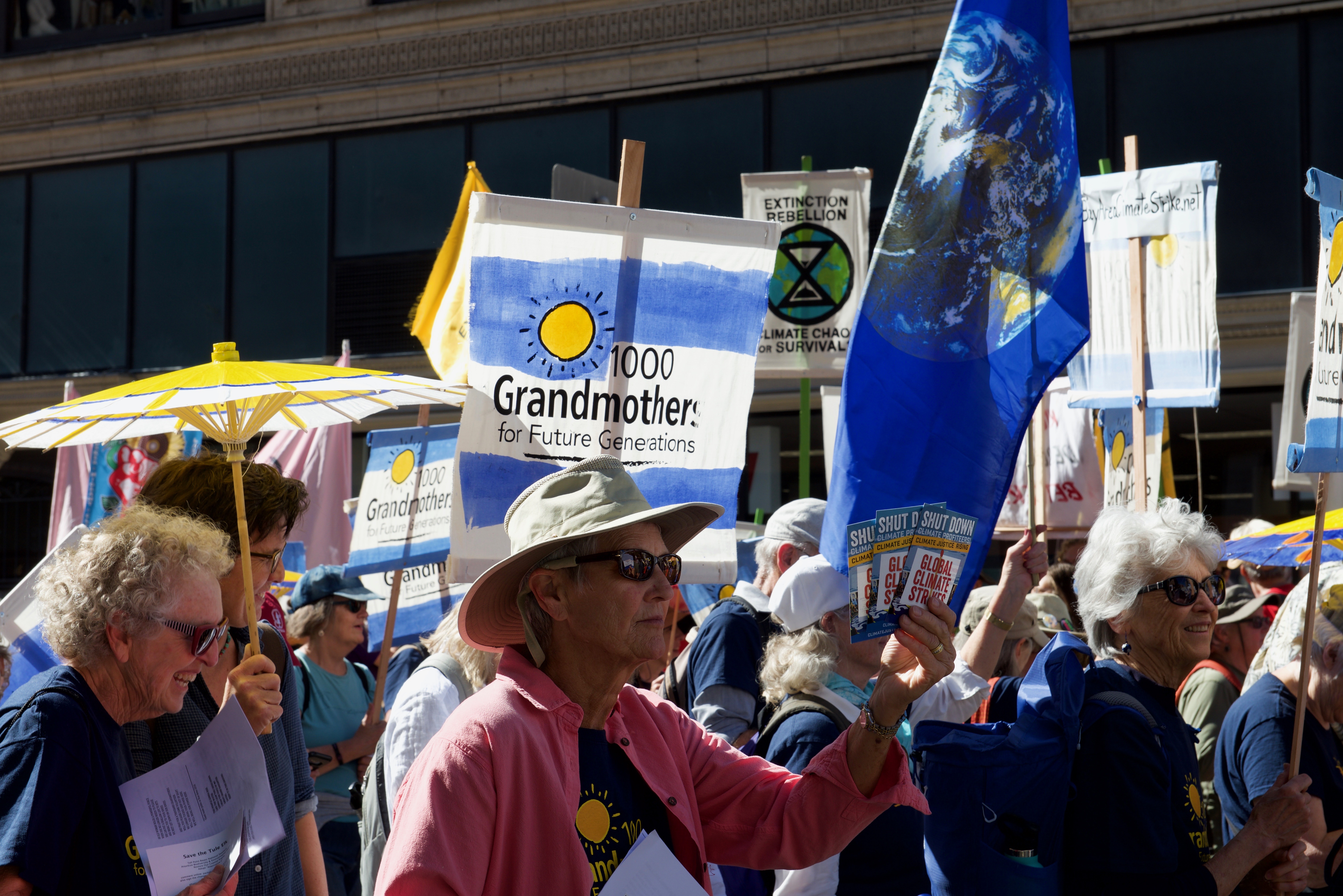 Grandmother contingent holds signs