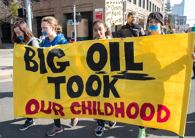 Activists holding sign