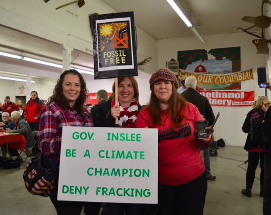 activists holding sign