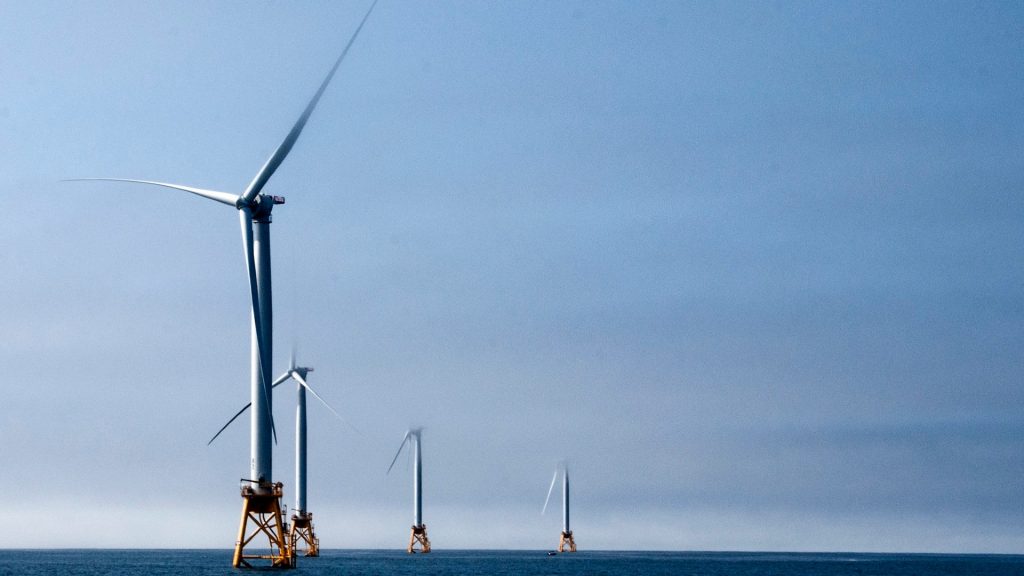 line of offshore turbines