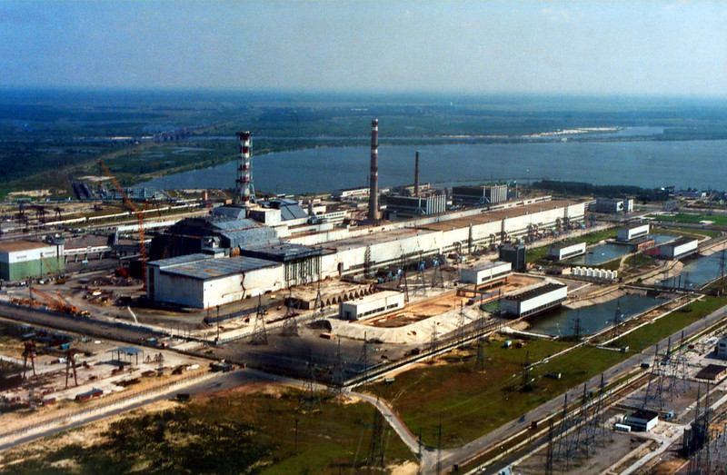 aerial view showing industrial facility next to water