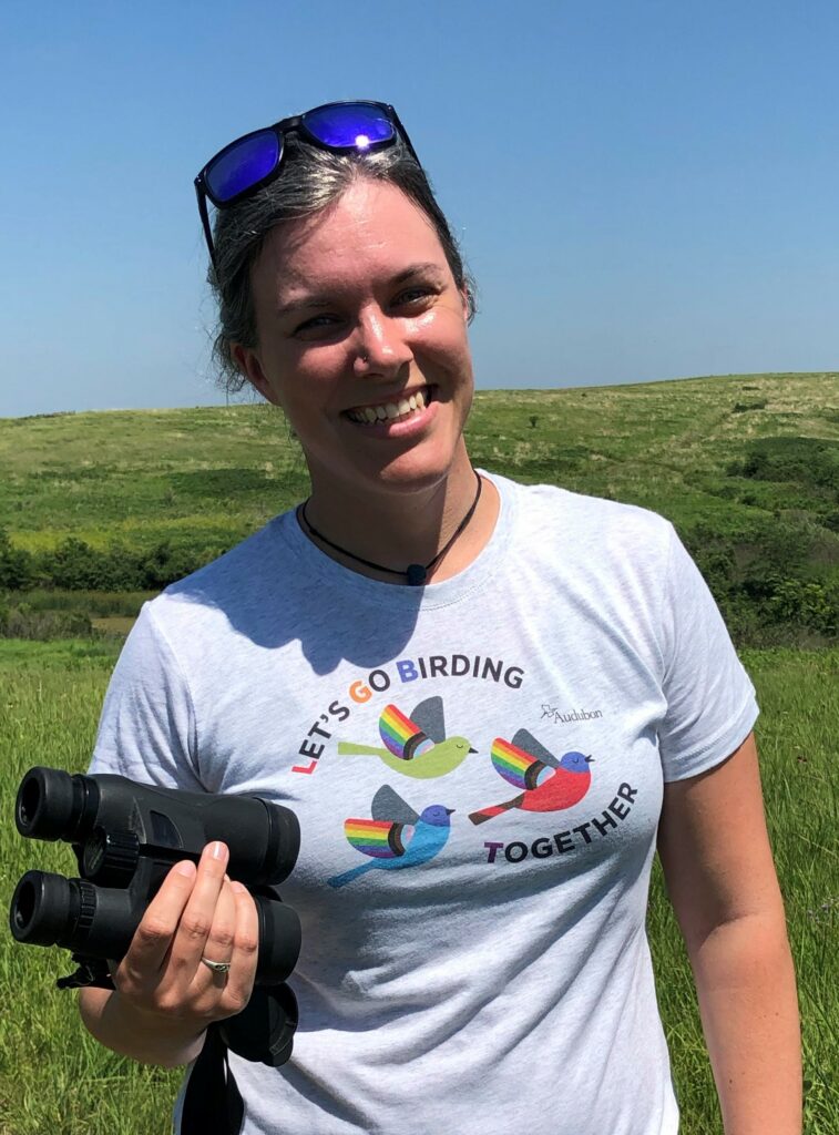 Woman holding binoculars