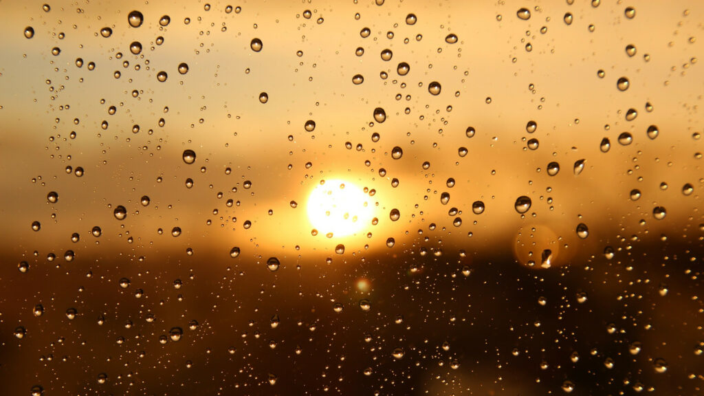 rain/tears over the sun